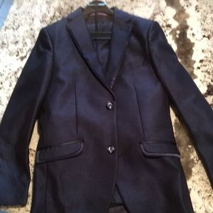 Gorgeous Navy blue 3 piece suit for a young boy.